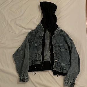 Perfect condition Jean jacket with attached sweater. Has a hood and zips.